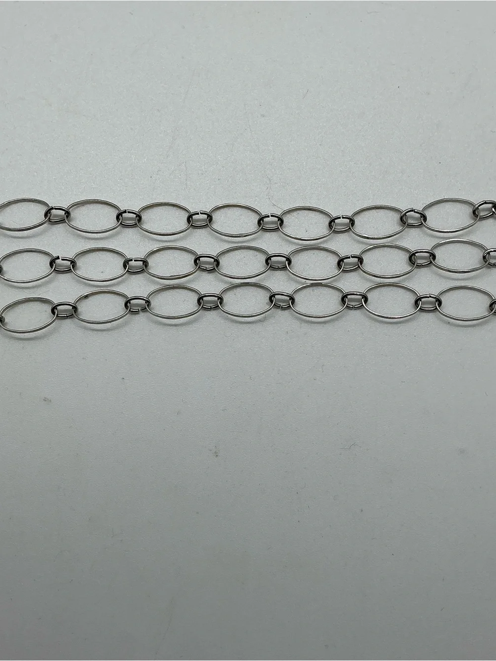 Silver Tone Metal Oval Link Chain 3 Strand Bracelet Lobster Clasp